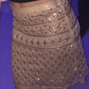 Classy beige mini skirt with sequins